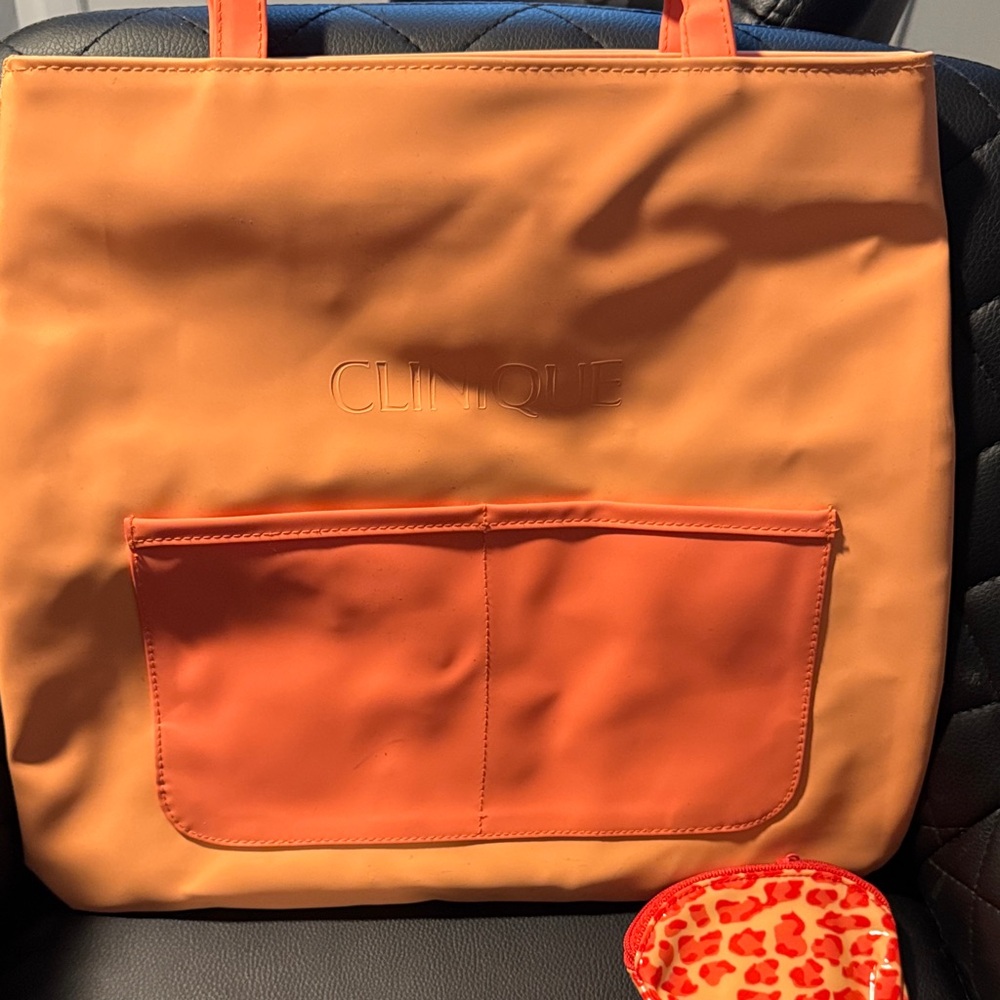 Clinique Dual-Tone Orange Tote with little coin purse.